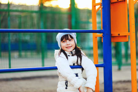 The Children happy outdoors play in playground.の写真素材