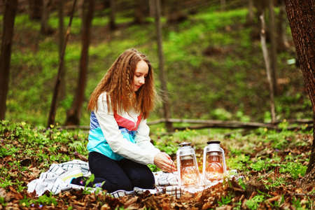 Young woman portrait happy on the outdoors.の写真素材