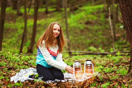 Young woman portrait happy on the outdoors.の写真素材