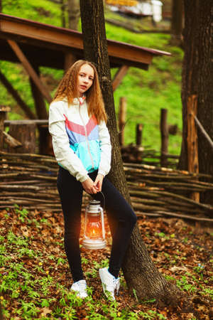 Young woman portrait happy on the outdoors.の写真素材