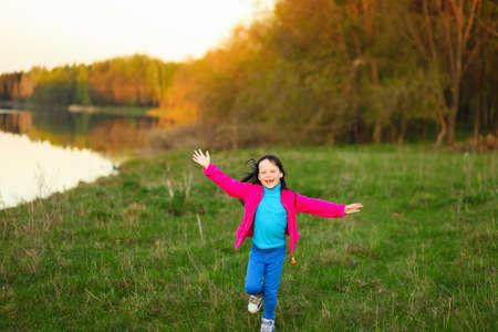 The child in park a outdoors happy.の写真素材