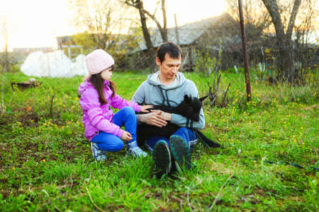 The Family happy outdoor rest a goat.の写真素材