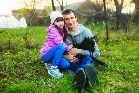 The Family happy outdoor rest a goat.の写真素材