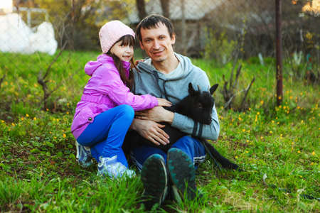 The Family happy outdoor rest a goat.の写真素材