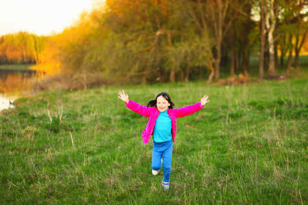 The child in park a outdoors happy.の写真素材