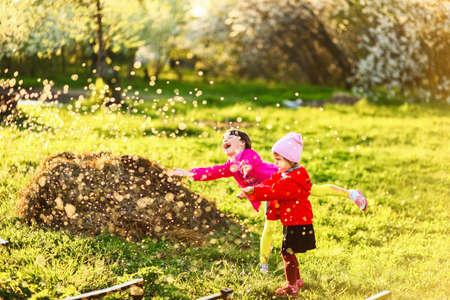 The child in garden happy resting outdoors.の写真素材