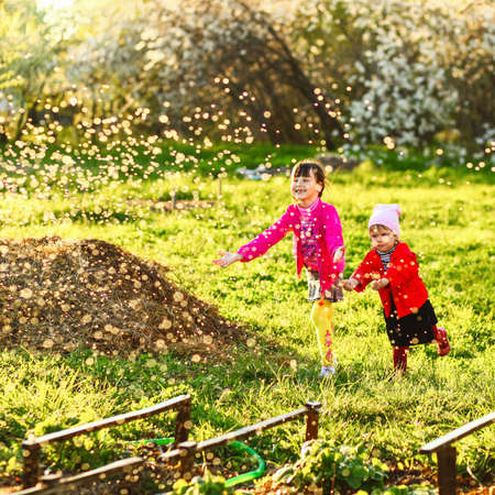 The child in garden happy resting outdoors.の写真素材