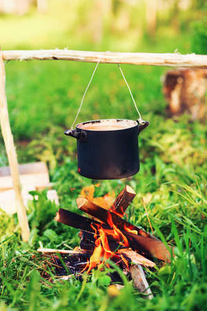 The cooking a pan the soup camping.の写真素材