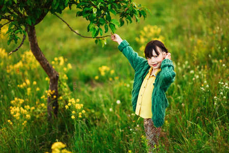 The child in park a outdoors happy.