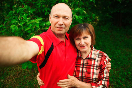 Beautiful portrait of the elderly in nature.の写真素材