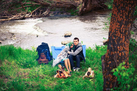 The Love story of young people outdoors.の写真素材