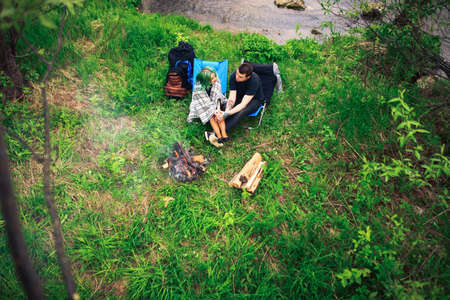 The Love story of young people outdoors.の写真素材