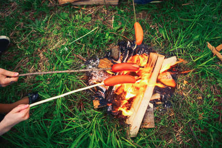Human hands are roasted on the grill.の写真素材