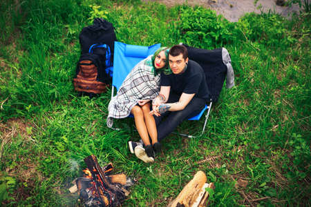 The Love story of young people outdoors.の写真素材