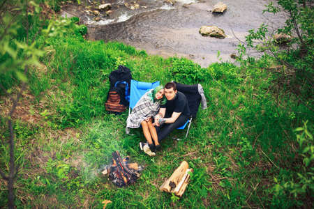 The Love story of young people outdoors.の写真素材