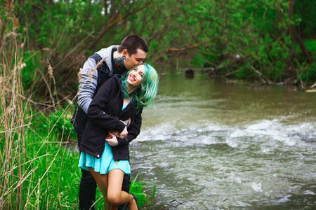 The Love story of young people outdoors.の写真素材