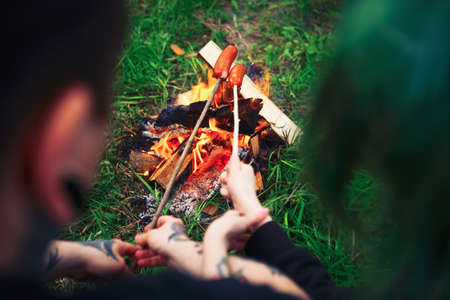 The Love story of young people outdoors.の写真素材