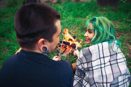 The Love story of young people outdoors.