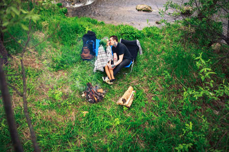 The Love story of young people outdoors.の写真素材