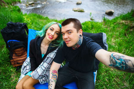 The Love story of young people outdoors.の写真素材