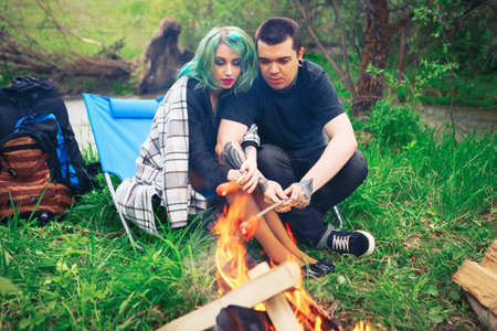 The Love story of young people outdoors.の写真素材