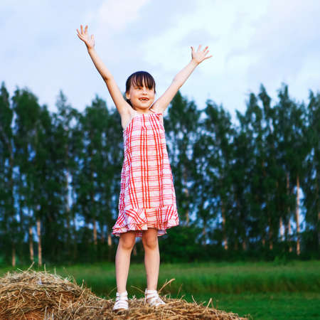 The Portrait of happy children in nature.の写真素材