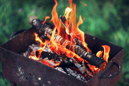 The fire is lit in the grill.の写真素材