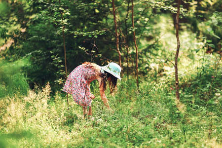 The Little girl walk in the forest.の写真素材