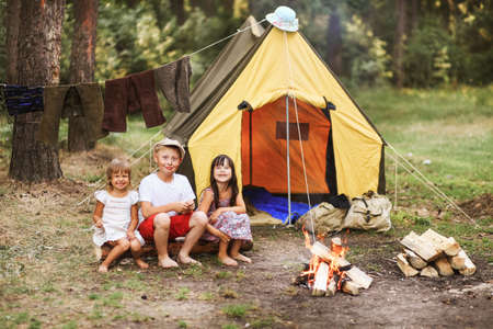 The Children walk in the campaign outdoors.の写真素材