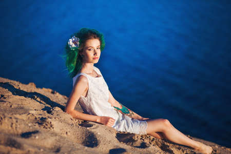 The Portrait of young woman a outdoors.の写真素材