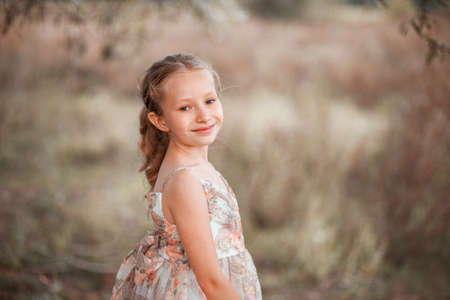 The Little girl in a beautiful dress.の写真素材