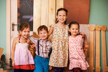 The Boy and girls in the workshop.