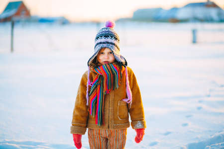 The Children playing outside in the winter.の写真素材