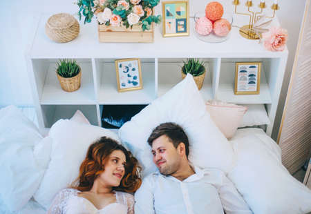 The Young pregnant woman in home interior.