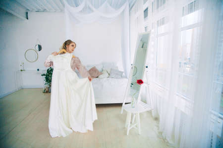 A beautiful and gentle morning of the bride.の写真素材