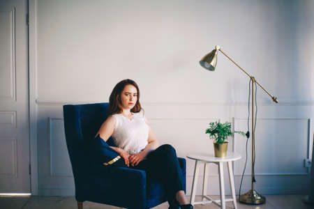 Portrait of a young woman in the studio.の写真素材