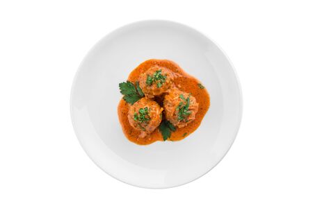meatballs in tomato sauce on white plate isolated on white background top viewの写真素材