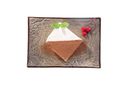 slice of Tiramisu cake traditional italian dessert on grey plate isolated on white background top viewの写真素材