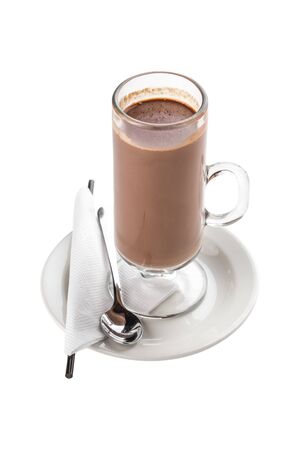tall cup with hot chocolate cocoa drink on white plate with spoon isolated on white background side viewの写真素材