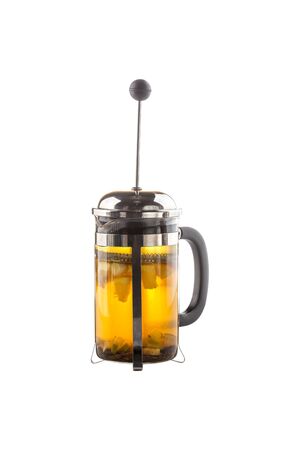 Citrus green tea with honey, spices in french press isolated on white background side viewの写真素材