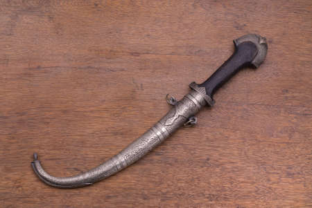 Arab traditional dagger on a wooden tableの写真素材