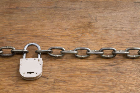 Old Style Padlock closing Chain の写真素材