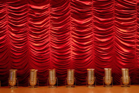 Red stage curtain with spotlightsの写真素材