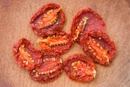 Sun Dried Tomatoes on Wooden Tableの写真素材