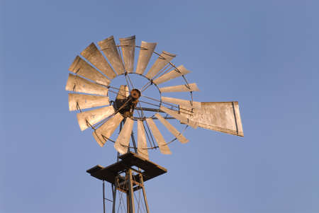 Windmill against blue sky.の写真素材