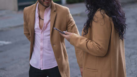Young business man walking through the city