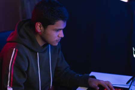 Young man doing a live video game sharing online. On different streaming platforms.の写真素材