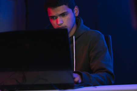 Young man doing a live video game sharing online. On different streaming platforms.