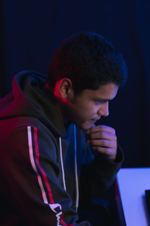 Young man doing a live video game sharing online. On different streaming platforms.
