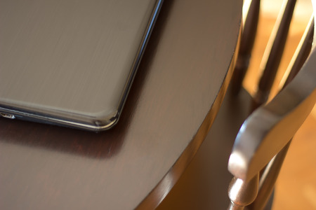 Chair and computer on table.の写真素材